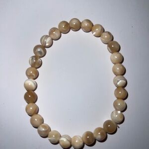 Beautiful beaded bracelet in neutral colors will match anything!